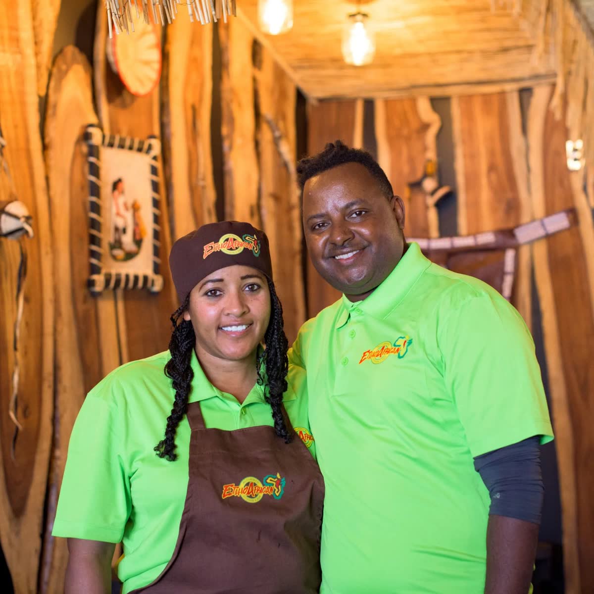 Anduale and Elsabet, the husband and wife owners, in the restaurant