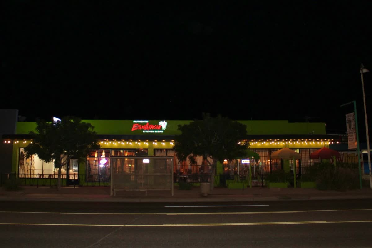The Phoenix restaurant lit up at night on McDowell Road