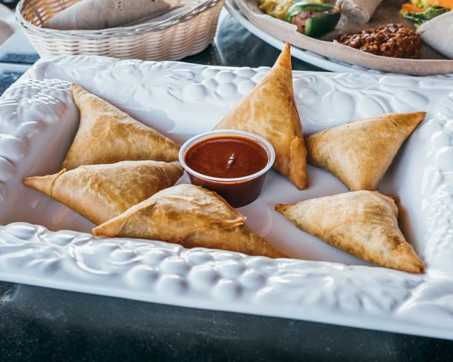 Crispy sambusas with dipping sauce